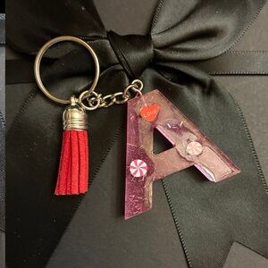 Pink Initial Keyring with Red Tassel